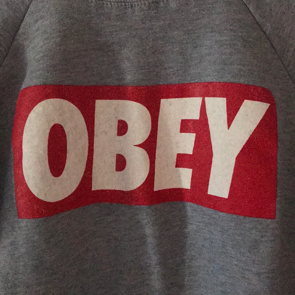 Grey “obey” cotton pullover.